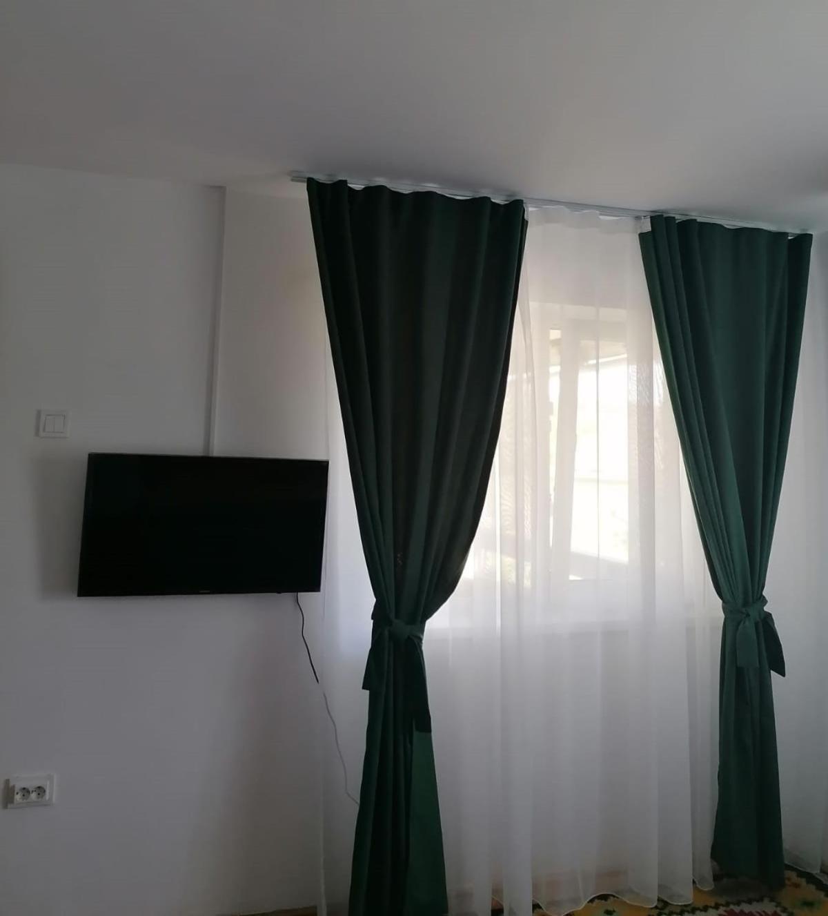 Апартаменти Cazare Vila Maria Куртя-де-Арджеш Номер фото